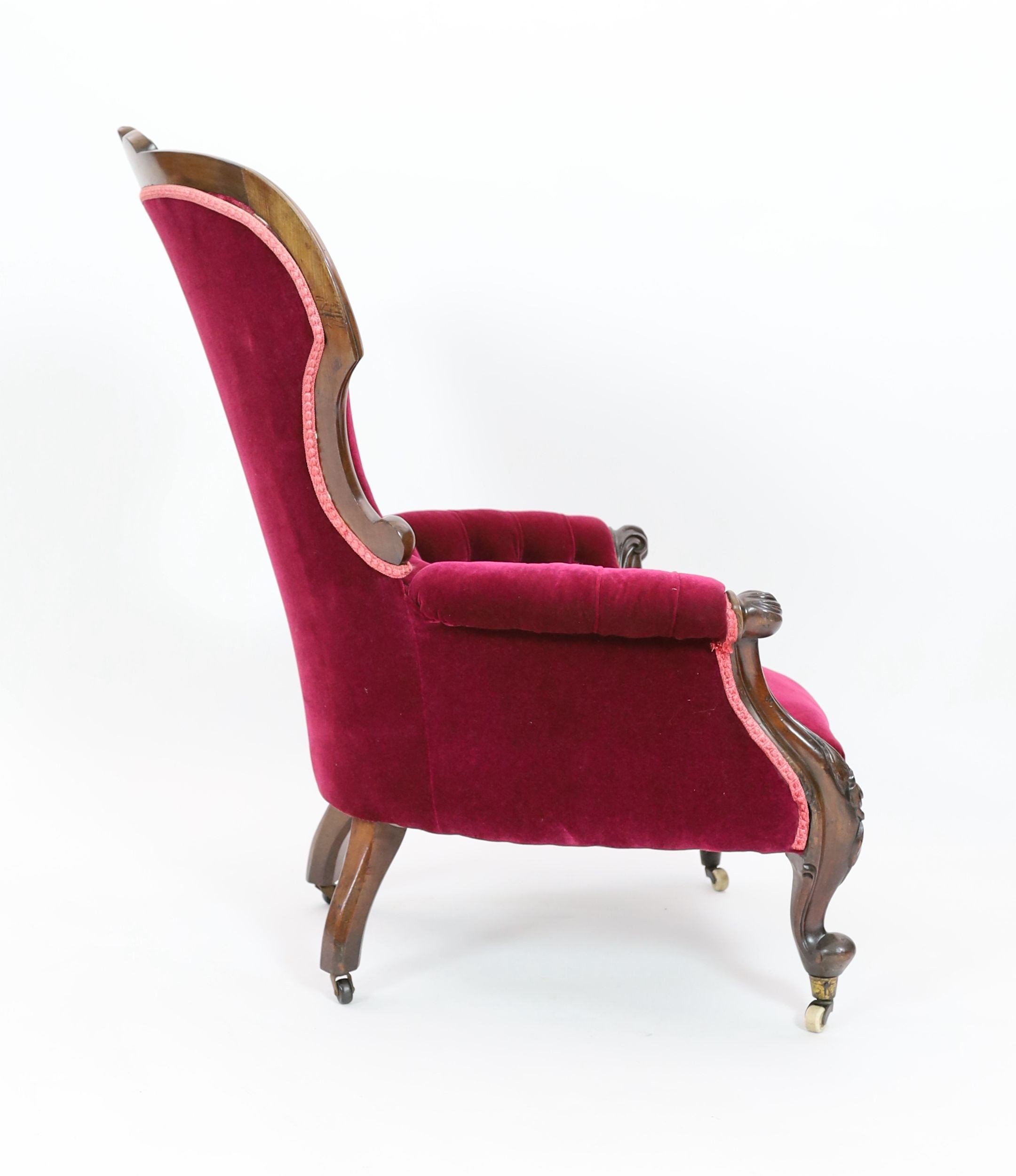 A Victorian walnut upholstered spoonback armchair, width 72cm depth 78cm height 102cm